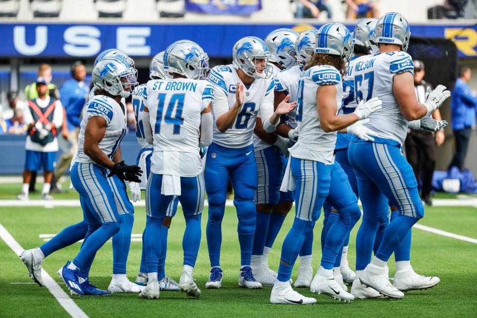 Detroit Lions quarterback Jared Goff (16) huddles with teammates before a first down against Los Angeles Rams during the first half at the SoFi Stadium in Inglewood, Calif. on Sunday, Oct. 24, 2021.