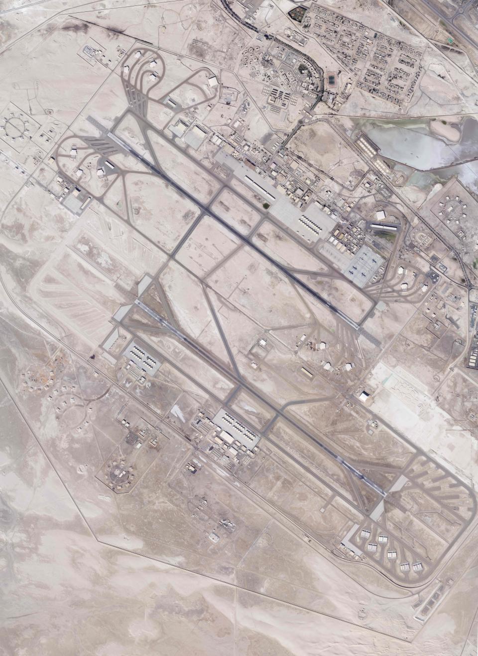 In this satellite photo by Planet Labs PBC, Al-Dhafra Air Base is seen in Abu Dhabi, United Arab Emirates, Jan. 14, 2022. The wars of the wider Middle East that long surrounded the United Arab Emirates now have encroached into daily life in this U.S.-allied nation, threatening to draw America further into a region inflamed by tensions with Iran. Al-Dhafra has been mentioned as a target by the Iranian-backed Houthi rebels in Yemen who have launched a series of UAE attacks. (Planet Labs PBC via AP)