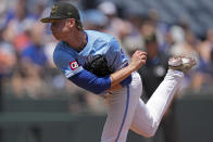 Kansas City Royals starting pitcher Brady Singer throws during the first inning of a baseball game against the Oakland Athletics Sunday, May 19, 2024, in Kansas City, Mo. (AP Photo/Charlie Riedel)