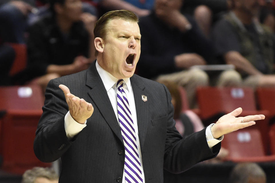 Stephen F. Austin head coach Brad Underwood gestures as the team plays Virginia Commonwealth during the first half of a second-round game in the NCAA college basketball tournament Friday, March 21, 2014, in San Diego. (AP Photo/Denis Poroy)