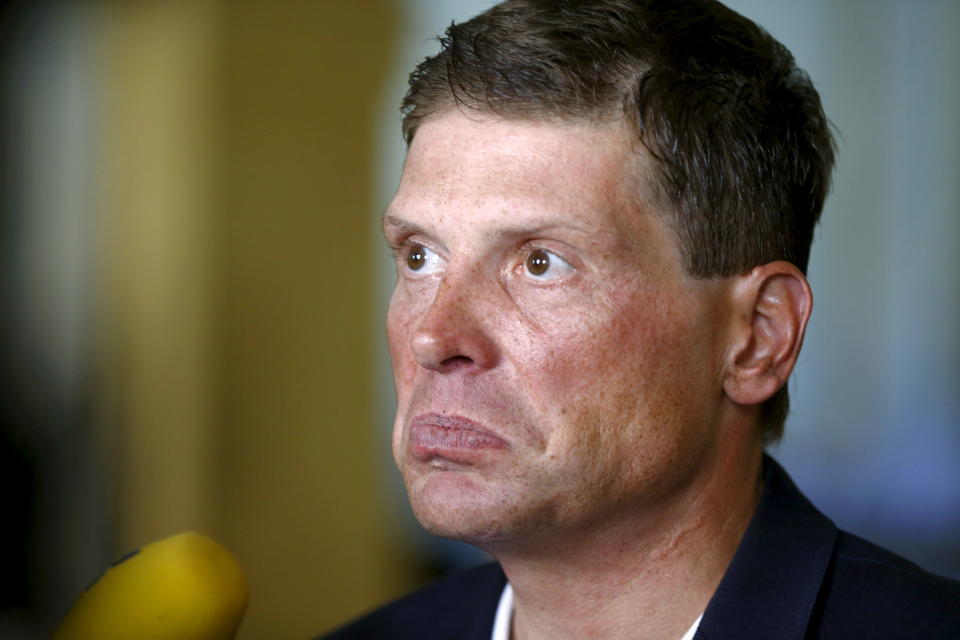 Former German cyclist and Tour de France winner Jan Ullrich addresses the media after a trial at the regional court in the northern Swiss town of Weinfelden, Switzerland, July 21, 2015. Ullrich appeared in the Swiss court on Tuesday to face drink driving charges after he caused an accident involving three cars in May 2014 which left no one injured. REUTERS/Arnd Wiegmann