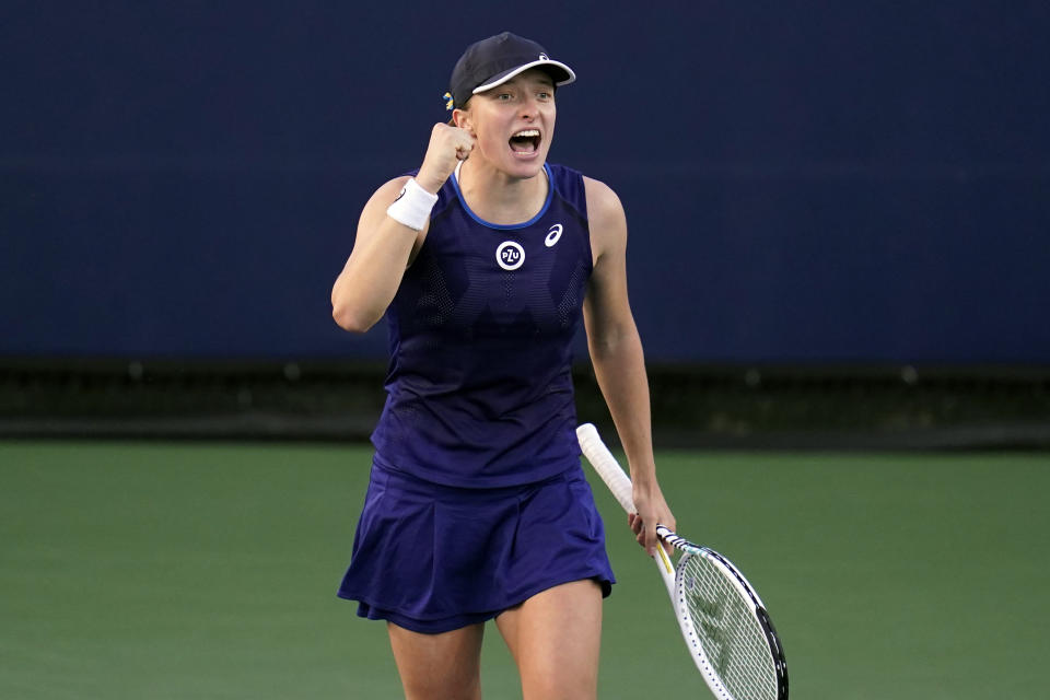 Iga Swiatek of Poland reacts after defeating Donna Vekic of Croatia to win the San Diego Open tennis tournament Sunday, Oct. 16, 2022, in San Diego. (AP Photo/Gregory Bull)