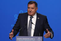 Bosnian Serb member of the tripartite Presidency of Bosnia Milorad Dodik holds a speech during the 4th Budapest Demographic Summit in Budapest, Hungary, Thursday, Sept. 23, 2021. The biannual demographic summit, which was first organized in 2015, offers a forum for "pro-family thinker" decision-makers, scientists, researchers, and church representatives of the same sort to exchange their thoughts about connections between demographics and sustainability. (AP Photo/Laszlo Balogh)