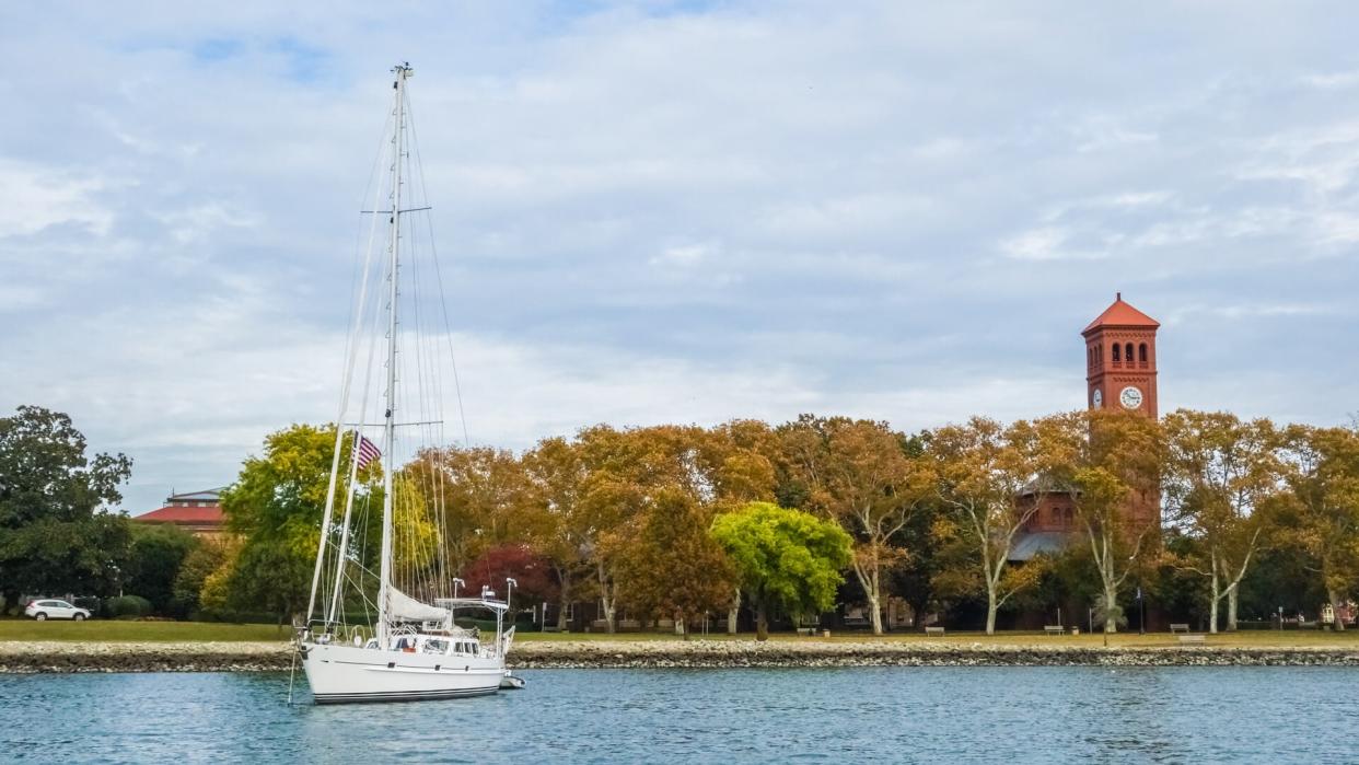 A sailboat anchored beside Hampton University in Hampton, Virginia.