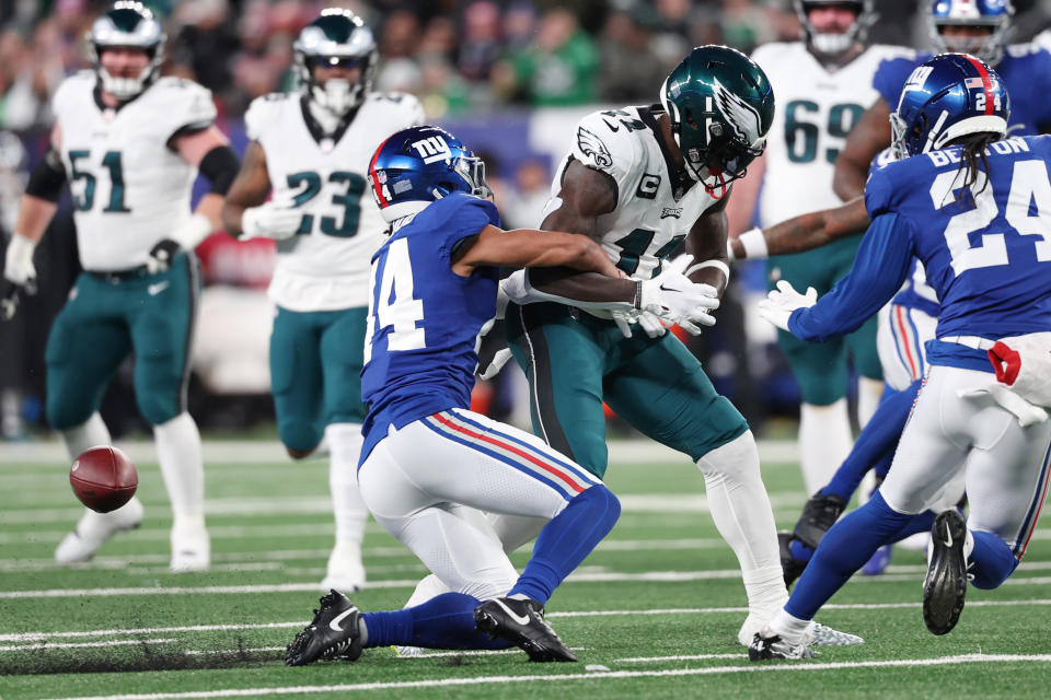 EAST RUTHERFORD, NEW JERSEY – JANUARY 07: Nick McCloud #44 of the New York Giants forces a fumble by A.J. Brown #11 of the Philadelphia Eagles during the first half at MetLife Stadium on January 07, 2024 in East Rutherford, New Jersey. (Photo by Al Bello/Getty Images)