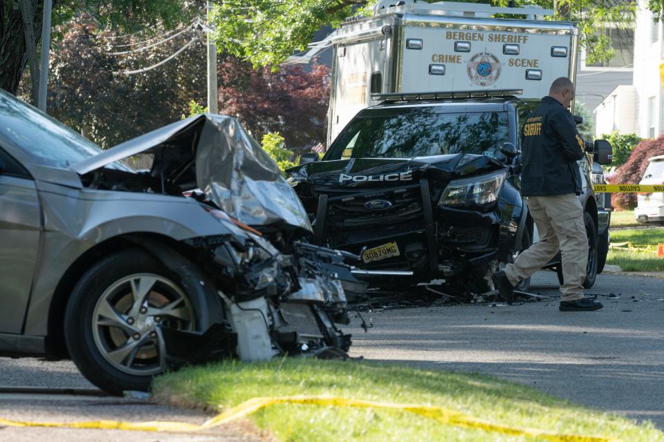 Bergen County Sheriff Crime Scene Unit investigates a head on collision between a Rutherford Police car and a sedan at the intersection of W Passaic Ave and Springfield Ave in Rutherford, NJ on Tuesday May 30, 2023. 