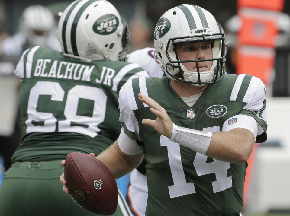 New York Jets quarterback Sam Darnold (14) looks to pass during the first half of an NFL football game against the Denver Broncos Sunday, Oct. 7, 2018, in East Rutherford, N.J. The Jets won 34-16. (AP Photo/Seth Wenig)