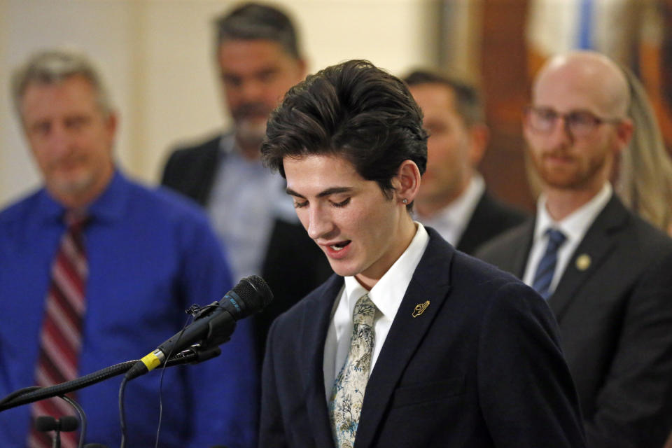 Nathan Dalley speaks during a news conference at the Utah State Capitol Thursday, Feb. 21, 2019, in Salt Lake City. Two Republican lawmakers proposed a ban on gay conversion therapy for minors in conservative Utah on Thursday, a plan that's been hailed as a milestone by advocates and won't be opposed by the influential Mormon church. Those who have been through conversion therapy, like 19-year-old Dalley, say it leaves them depressed and can lead to suicide attempts. (AP Photo/Rick Bowmer)