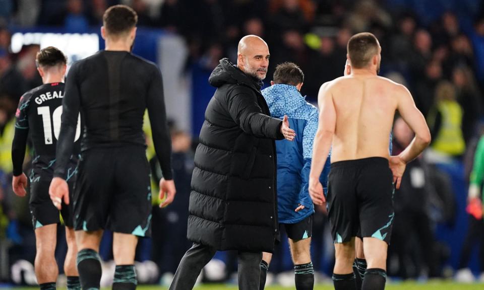 <span>Pep Guardiola (centre) has complained about his team’s workload in recent weeks.</span><span>Photograph: Zac Goodwin/PA</span>