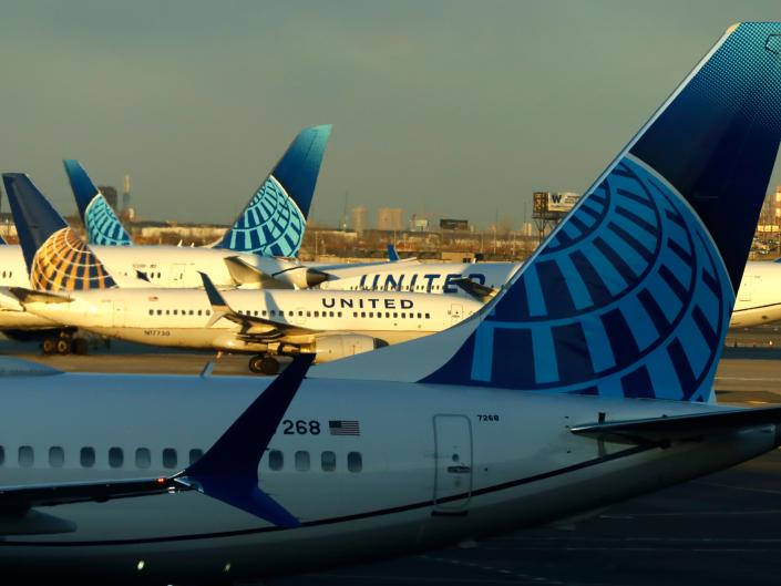 United Airlines airplanes parked at gates at Terminal C at Newark Liberty Airport