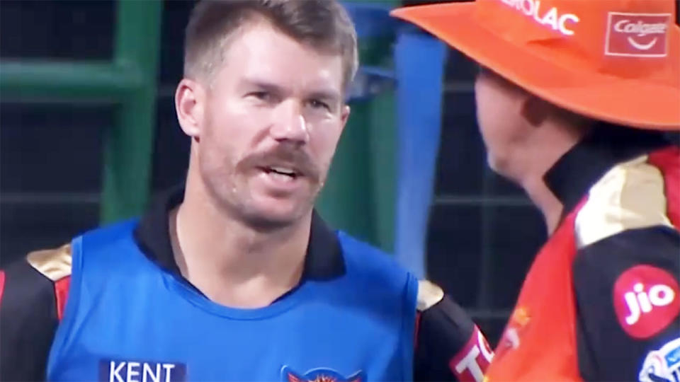 David Warner, pictured here speaking to Trevor Bayliss during Sunrisers Hyderabad's loss to Rajasthan Royals.