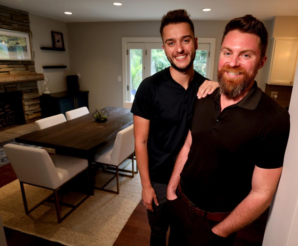 Darrin Driesenga, 28, and partner Chris Roberts, 34, inside the dining area of their Royal Oak home on Oct. 1, 2019.