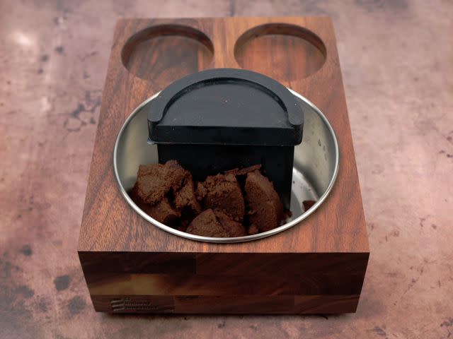 <p>Serious Eats / Jesse Raub</p> After just two espresso pucks, the St. Anthony Industries knock box was full.