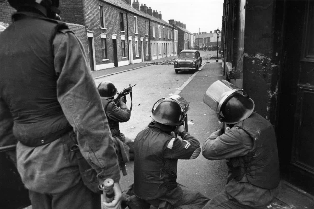 British soldiers take aim at civil-rights demonstrators in the Falls Road, Belfast (Getty Images)