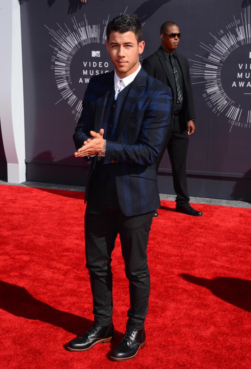 Nick Jonas arrives at the MTV Video Music Awards at The Forum on Sunday, Aug. 24, 2014, in Inglewood, Calif. (Photo by Jordan Strauss/Invision/AP)