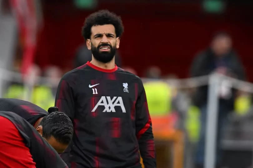 Liverpool star Mohamed Salah warms up ahead of the Premier League encounter with Sheffield United.