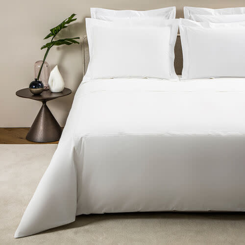 <p><a href="https://go.redirectingat.com?id=74968X1596630&url=https%3A%2F%2Fwww.frette.com%2Fen_US%2Fhotel-classic-duvet-cover.html%3Fdwvar_hotel-classic-duvet-cover_color%3DWhite%26dwvar_hotel-classic-duvet-cover_size%3DQueen%26quantity%3D1&sref=https%3A%2F%2Fwww.cosmopolitan.com%2Flifestyle%2Fg28246000%2Fbest-duvet-covers%2F" rel="nofollow noopener" target="_blank" data-ylk="slk:Shop Now;elm:context_link;itc:0;sec:content-canvas" class="link rapid-noclick-resp">Shop Now</a></p><p>Hotel Classic Duvet Cover</p><p>$550.00</p><p>frette.com</p><span class="copyright">Frette Home </span>