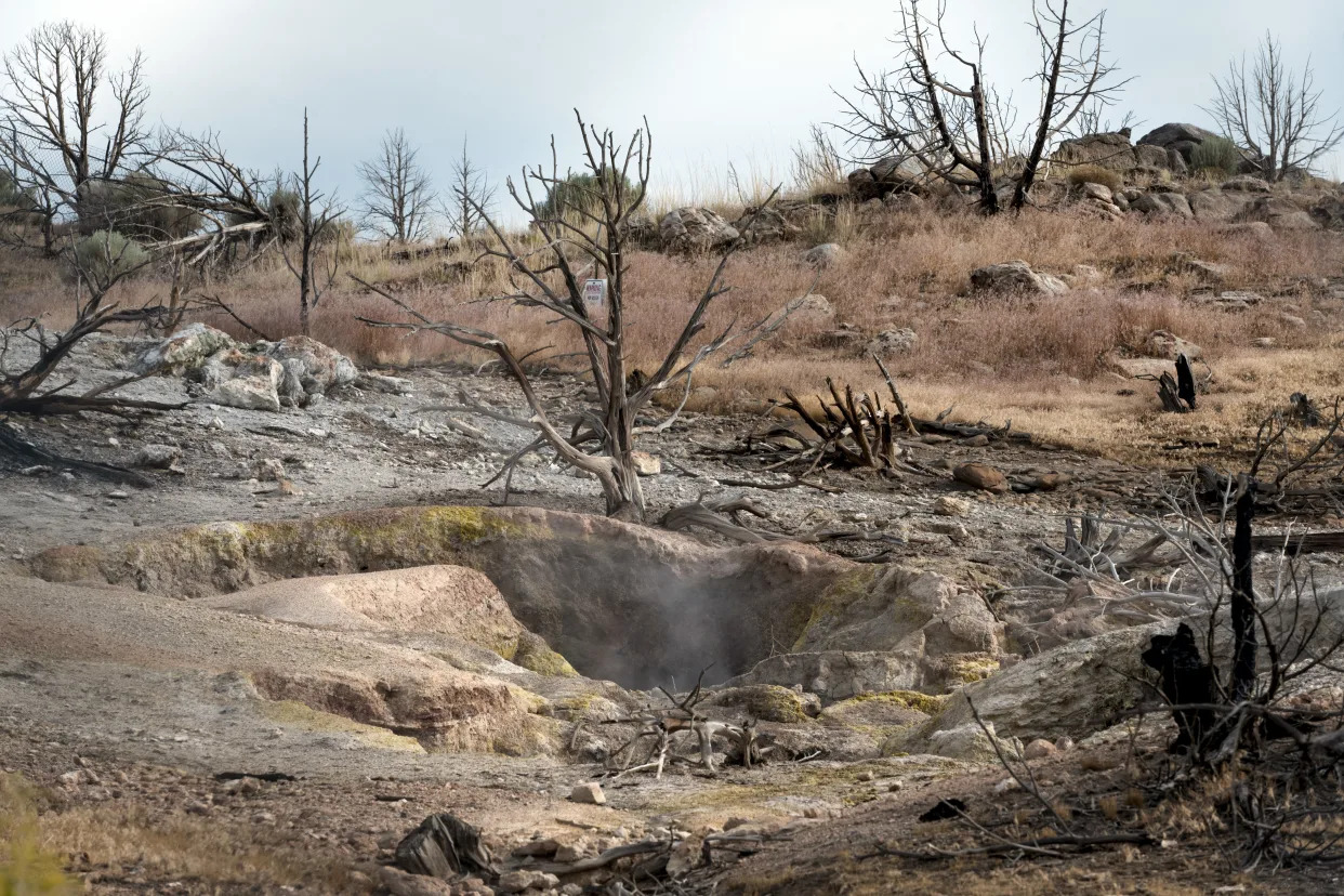 Steam rises from the Roosevelt Hot Springs, near the FORGE and Fervo geothermal sites outside of Milford, Utah, on July 31, 2023. (Brandon Thibodeaux/The New York Times)