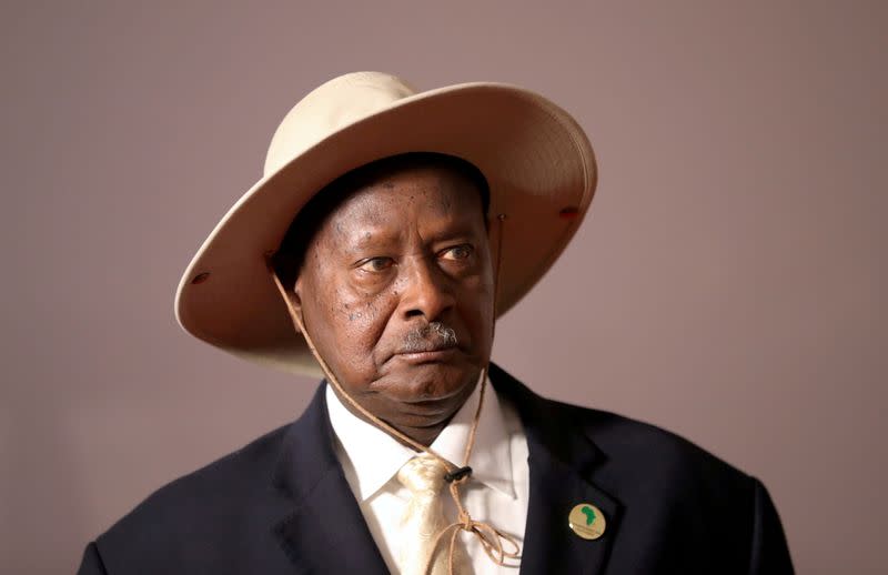 FILE PHOTO: Uganda's President Yoweri Museveni arrives for a group picture at the BRICS summit meeting in Johannesburg