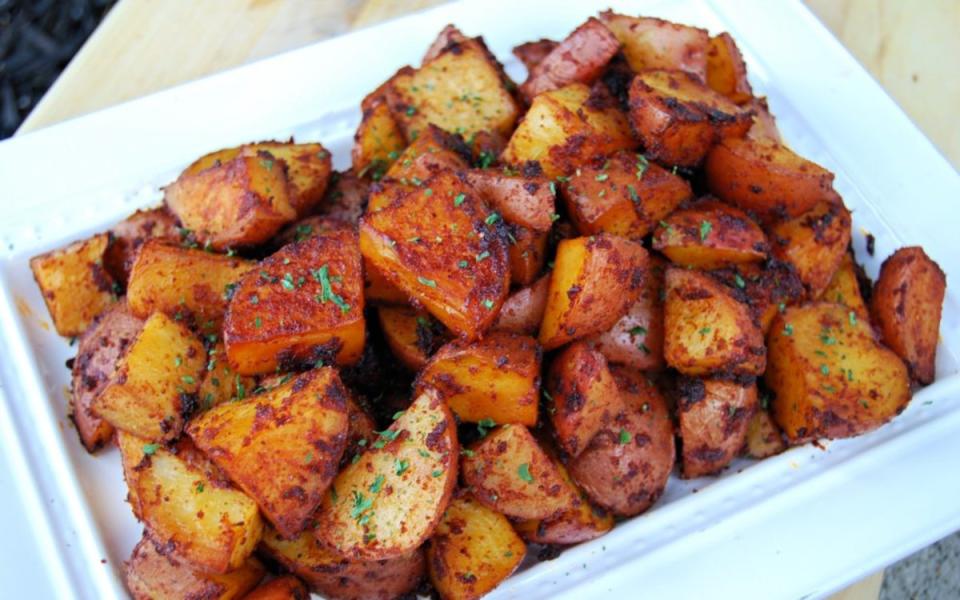 <p>Krista Marshall</p><p>Why not take all the flavors we love from a good summer barbecue recipe and incorporate them into a potato side dish? <strong>Get the recipe: <a href="/887946/kristamarshall/roasted-bbq-potatos/" data-ylk="slk:Barbecue Roasted Potatoes;elm:context_link;itc:0;sec:content-canvas" class="link ">Barbecue Roasted Potatoes</a></strong></p>