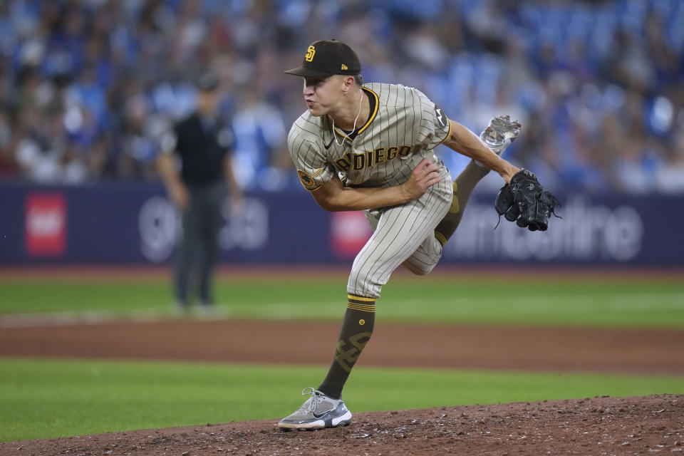 San Diego Padres relief pitcher Alek Jacob works against the Toronto Blue Jays during the ninth inning of a baseball game Tuesday, July 18, 2023, in Toronto. (Chris Young/The Canadian Press via AP)