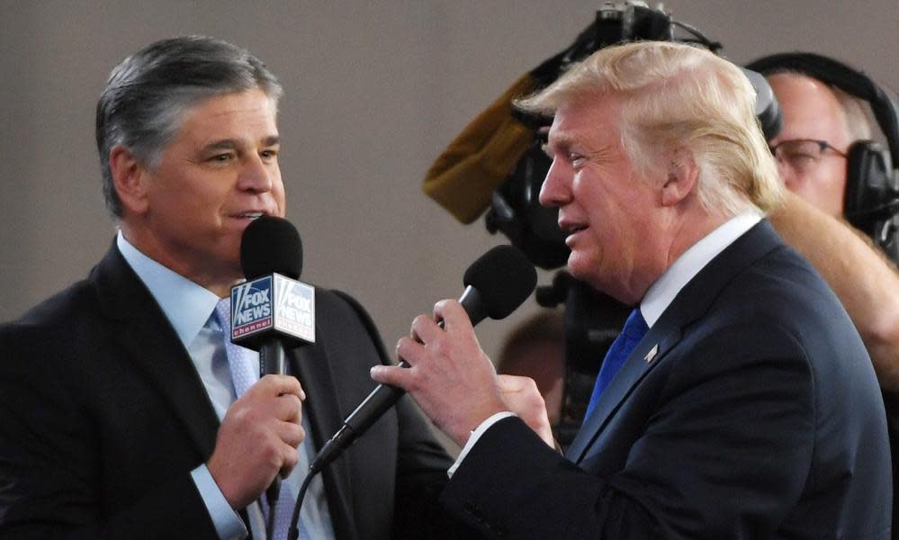 Fox News Channel and radio talk show host Sean Hannity interviews Trump at a campaign rally at the Las Vegas Convention Center 