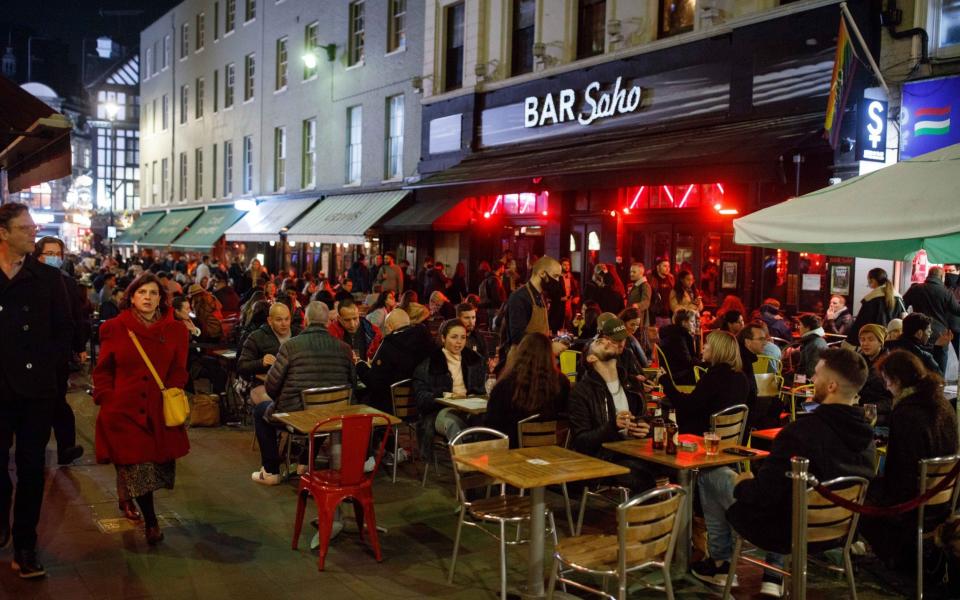 London's Old Compton Street was taken over by a slew of businesses to allow the public to sit outside  - Jamie Lorriman