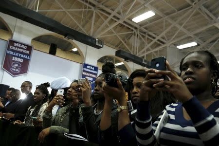 People take part in a rally with U.S. Democratic presidential candidate Hillary Clinton at South Carolina State University in Orangeburg, South Carolina February 26, 2016. REUTERS/Jonathan Ernst