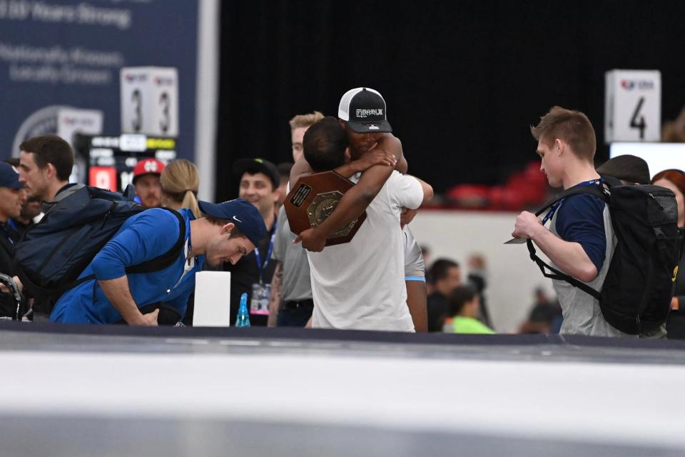 Adaugo Nwachukwu, a two-time NAIA national champ for Iowa Wesleyan, won the Senior women's freestyle national title at USA Wrestling's U.S. Open on Saturday in Las Vegas. Here, she's hugging her coaches after winning her finals match.