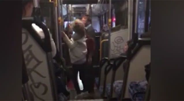 The moment the woman slaps the bus driver across the face while storming off the bus. Source: News Corp