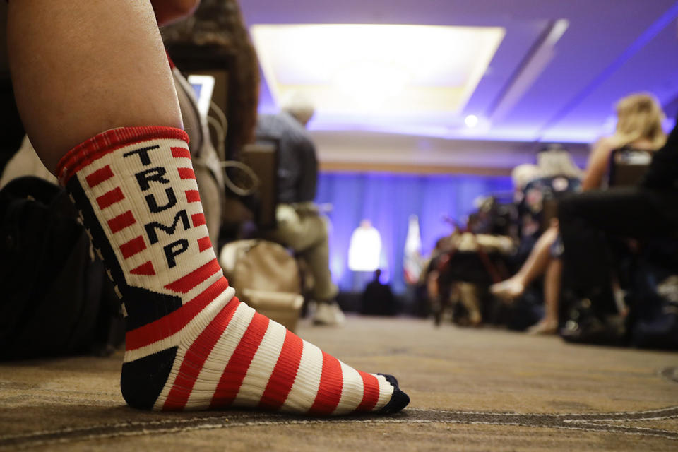 A Trump supporter listens as Brad Parscale, campaign manager for Trump's 2020 reelection campaign, speaks during the California GOP fall convention on Saturday, Sept. 7, 2019, in Indian Wells, Calif. (AP Photo/)