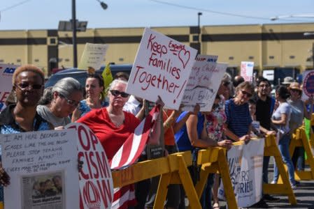 People participate in a protest against recent U.S. immigration policy of separating children from their families when they enter the United States as undocumented immigrants, in front of a Homeland Security facility in Elizabeth, NJ, U.S., June 17, 2018. REUTERS/Stephanie Keith