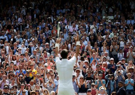 Britain Tennis - Wimbledon - All England Lawn Tennis & Croquet Club, Wimbledon, England - 27/6/16 Serbia's Novak Djokovic celebrates winning his match against Great Britain's James Ward REUTERS/Paul Childs