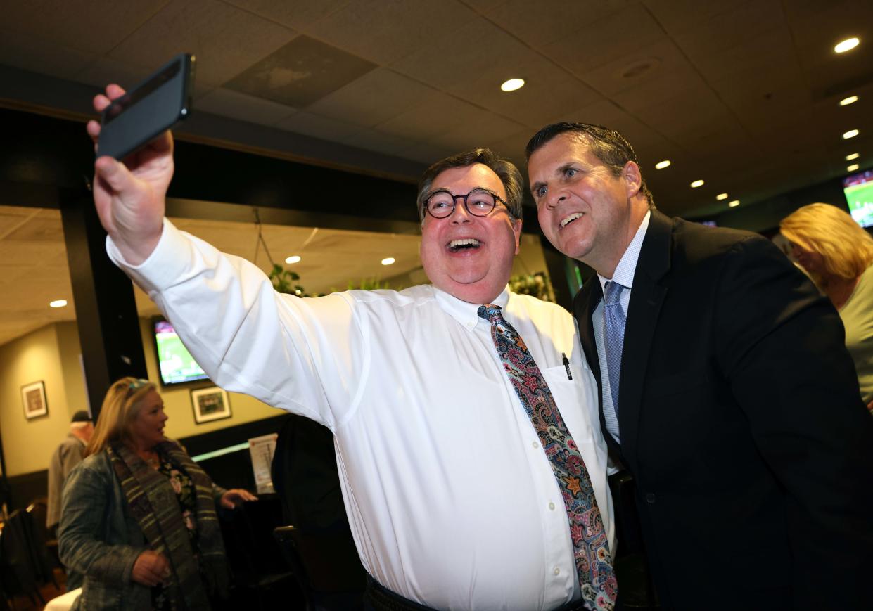 Mayor Robert Sullivan, right, after he was re-elected on Tuesday, Nov. 8, 2023 and celebrated at Tommy Doyle's at Sidelines.