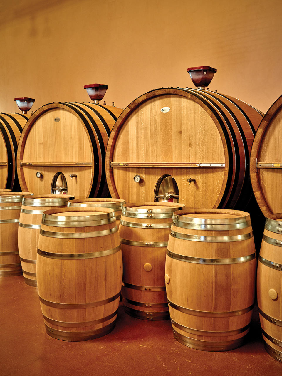 The large foudre containers Bodegas Emilio Moro uses for aging some wines result in less obvious oak flavors than the smaller barriques in the foreground.