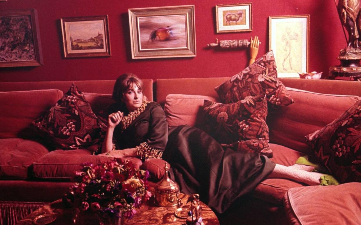 Diana Phipps photographed in her London house in 1967 by Vogue, which observed: 'she seems to have come through a time machine from the 18th century'