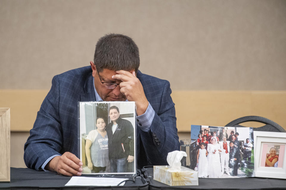 Mark Arcand, who's sister Bonnie Burns and nephew Gregory "Jonesy" Burns were killed during a series of violence attacks at James Smith Cree Nation speaks to media at a press conference while holding a photo in Saskatoon on Wednesday, Sept. 7, 2022. Myles Sanderson, 32, and his brother Damien, 30, are accused of killing 10 people and wounding 18 in a string of attacks across an Indigenous reserve and in the nearby town of Weldon. Damien was found dead Monday, and police were investigating whether his own brother killed him. (Liam Richards /The Canadian Press via AP)