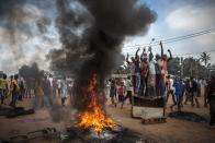 William Daniels, a French photographer working for Panos Pictures on assignment for Time, won the 2nd Prize General News Stories of the 2014 World Press Photo Contest with his series of pictures which includes this one of demonstrators gathering on the streets of Bangui taken on November 17, 2013. REUTERS/William Daniels/World Press Photo Handout via Reuters