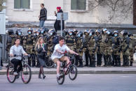 Russian policemen stand in preparation for a possible opposition rally in support of jailed opposition leader Alexei Navalny in Khabarovsk, 6,100 kilometers (3,800 miles) east of Moscow, Russia, Wednesday, April 21, 2021. Navalny's team has called for nationwide protests on Wednesday following reports that the politician's health was deteriorating in prison, where he has been on hunger strike since March 31. Russian authorities have stressed that the demonstrations were not authorized and warned against participating in them. (AP Photo/Igor Volkov)