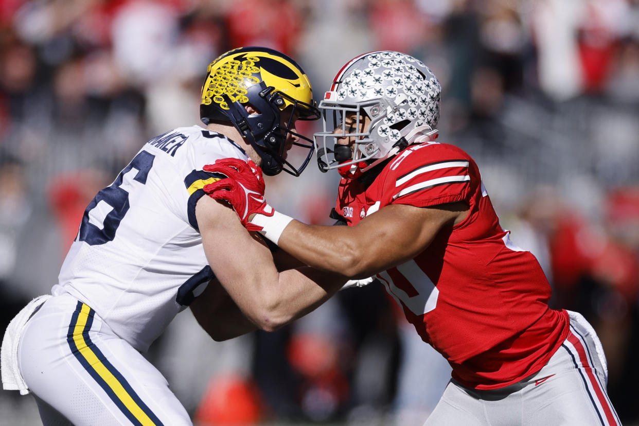 A Buckeye and a Wolverine square off during the 2022 game. (Joe Robbins/Icon Sportswire via Getty Images)