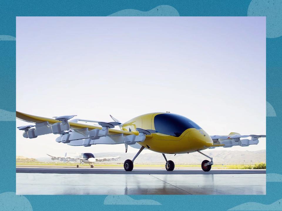 Photo of Kittyhawk's yellow Cora vehicle against a blue background