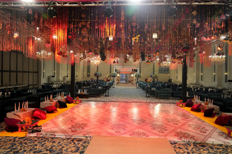 A decorated hall of the Manor marquee is ready for a wedding ceremony at a wedding halls compound, in Islamabad, Pakistan, Saturday, Jan. 20, 2024. Businessmen in the capital Islamabad have taken the idea of convenience and developed a wedding compound that sits next to a six-lane highway. There are a dozen venues in this location, some are marriage multiplexes offering more than one hall. (AP Photo/Anjum Naveed)