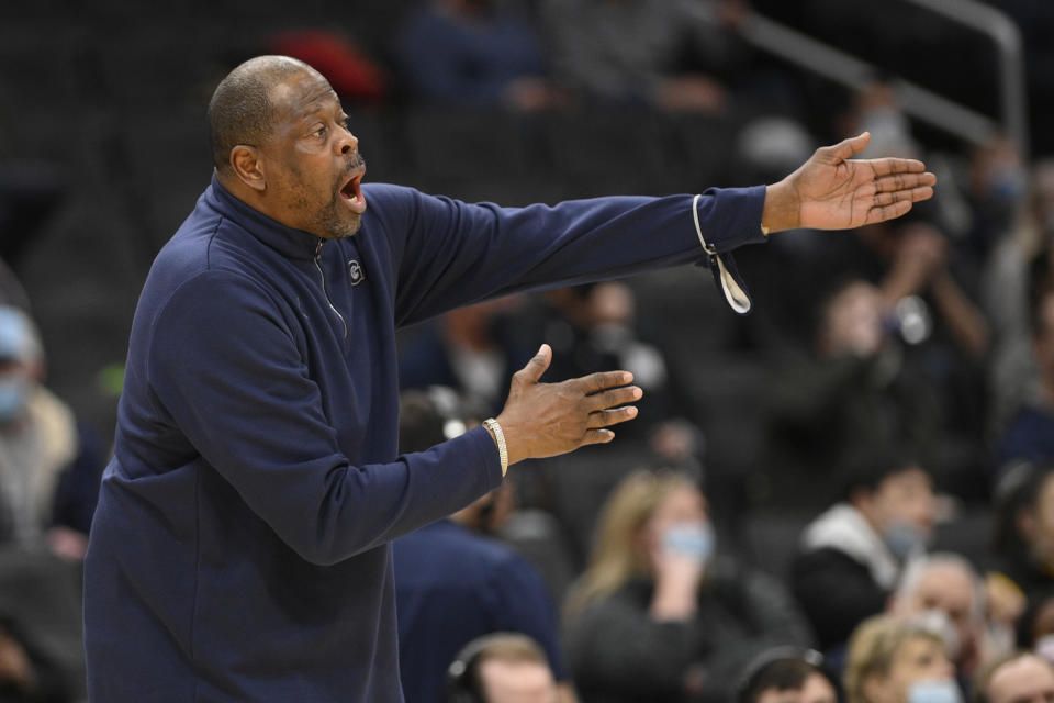 FILE - Georgetown head coach Patrick Ewing reacts during the first half of an NCAA college basketball game against Connecticut, Sunday, Feb. 27, 2022, in Washington. Georgetown basketball coach Patrick Ewing's loss-filled stint at his alma mater was called a “challenging and frustrating time" by athletic director Lee Reed, who added Wednesday, Jan. 4, 2023, that “no one is more committed” to turning things around than the former star center. (AP Photo/Nick Wass, File)