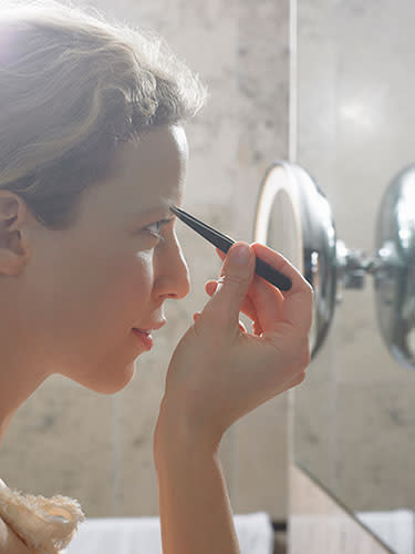 <div class="caption-credit"> Photo by: Getty Images</div><div class="caption-title">Plucking your own eyebrows</div>"Your brows shape your face and set the canvas for your makeup," says Tivichi. She sees many women who pluck their brows too thin for their features, and so recommends that every woman see an eyebrow specialist who can create the most flattering shape for her face. "And don't touch your eyebrows in between appointments - you must let them grow in," she says. If you're letting your brows grow out, try using a brow pencil to create a higher arch or filling in bald areas for the illusion of thicker brows.<b><br> <br> More from REDBOOK: <br></b> <ul> <li> <a rel="nofollow noopener" href="http://www.redbookmag.com/love-sex/advice/marriage/iconic-kisses-in-history?link=rel&dom=yah_life&src=syn&con=blog_redbook&mag=rbk" target="_blank" data-ylk="slk:The Most Iconic Kisses of All Time;elm:context_link;itc:0;sec:content-canvas" class="link ">The Most Iconic Kisses of All Time</a> </li> <li> <a rel="nofollow noopener" href="http://www.redbookmag.com/recipes-home/tips-advice/cleaning-organize/clutter-tips?link=rel&dom=yah_life&src=syn&con=blog_redbook&mag=rbk" target="_blank" data-ylk="slk:26 Organizing Tips That Actually Work;elm:context_link;itc:0;sec:content-canvas" class="link ">26 Organizing Tips That Actually Work</a> </li> </ul>