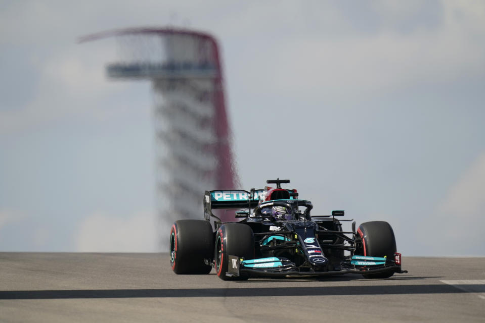 Mercedes driver Lewis Hamilton, of Britain, steers through a turn during an open practice for the Formula One U.S. Grand Prix auto race at the Circuit of the Americas, Friday, Oct. 22, 2021, in Austin, Texas. (AP Photo/Eric Gay)