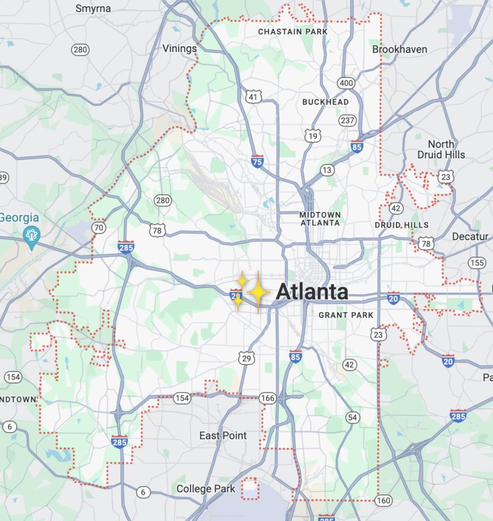 Map of Atlanta showing major highways, neighborhoods, parks, and surrounding areas including Smyrna, Buckhead, Decatur, and Sandy Springs