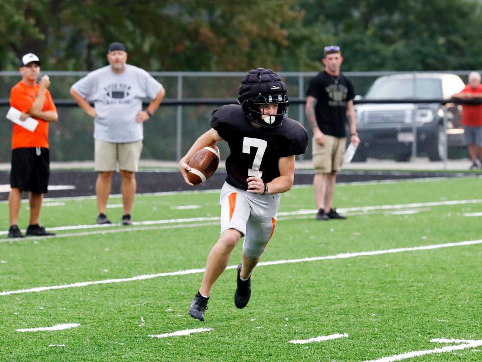 New Lexington junior Carson Kellogg runs with the ball during a scrimmage on Aug. 5 against River View at Jim Rockwell Stadium in New Lexington. Kellogg will be one of the running backs tasked with replacing All-Ohioan Hunter Rose in 2023.