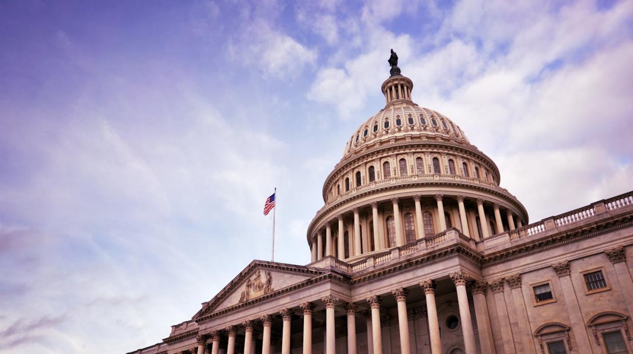Would term limits lead to a more effective and less polarized Congress? <a href="https://www.gettyimages.com/detail/photo/capitol-building-dome-with-american-flag-royalty-free-image/2024343351?phrase=building+u.s.+capitol+&adppopup=true" rel="nofollow noopener" target="_blank" data-ylk="slk:Andrey Denisyuk/Getty Images;elm:context_link;itc:0;sec:content-canvas" class="link ">Andrey Denisyuk/Getty Images</a>