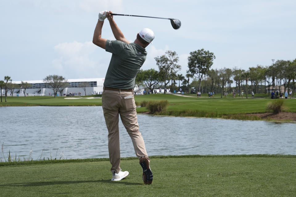 Chris Kirk hits from the ninth tee during the first round of the Cognizant Classic golf tournament, Thursday, Feb. 29, 2024, in Palm Beach Gardens, Fla. (AP Photo/Marta Lavandier)