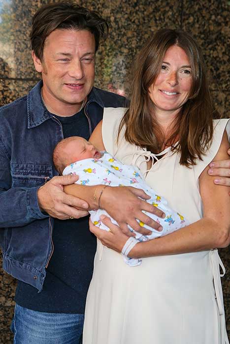 Jools and Jamie with baby River